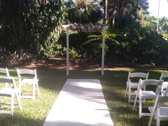 Coastal wedding ceremony alter and furniture at Townsville marriage ceremony with celebrant Amanda Medill