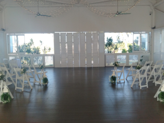 Indoor chic marriage ceremony for wedding in Townsville performed by celebrant Amanda Medill