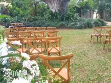 Rustic wedding aisle and furniture at marriage ceremony in Townsville with celebrant Amanda Medill
